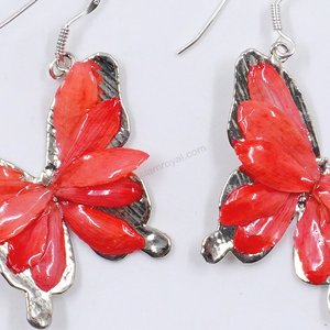 Silver plated Bird's Nest Fern cut into butterfly shape as base is layered with delicate flower Petals in assorted colors in 3D style; preserved in flexible, clear coating. Flower Petal colors can be changed.