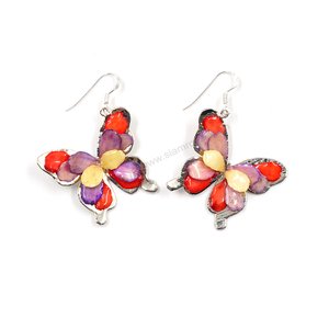 Silver plated Bird's Nest Fern cut into butterfly shape as base is layered with delicate flower Petals in assorted colors in 3D style; preserved in flexible, clear coating. Flower Petal colors can be changed.