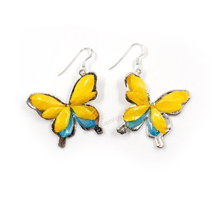 Silver plated Bird's Nest Fern cut into butterfly shape as base is layered with delicate flower Petals in assorted colors in 3D style; preserved in flexible, clear coating. Flower Petal colors can be changed.